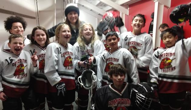 Image of happy Cambridge hockey team!